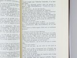 an open book with a picture of a cat on it