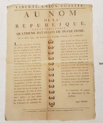 un vieux journal français sur lequel figure une liste d'articles