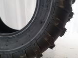 a close up of a tire on a white background with a white curtain