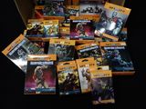 a lot of video games in a box on a table