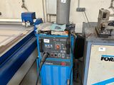 a picture of a machine that is working on a piece of wood
