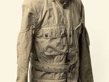jacket on a mannequin stand on a white background