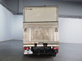 an image of a white truck with a box on the back of it