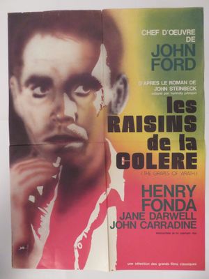 On voit l'affiche du film *Raising the Colore*
