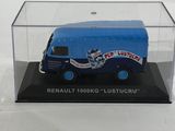 a toy truck in a clear case on a white surface