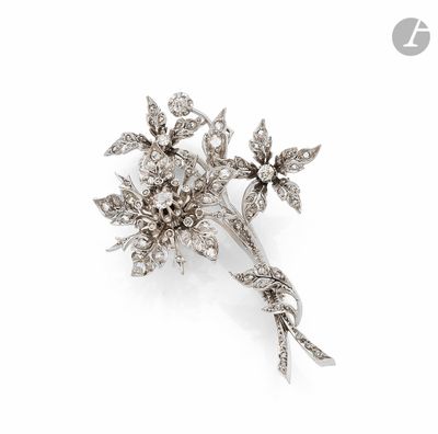 une image représentant une broche en forme de fleur en diamant sur fond blanc