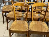 a lot of chairs that are lined up on the floor