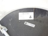 a sticker on the side of a toilet seat