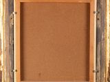 an old picture frame with a cork board in the middle