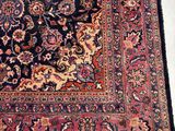 an oriental rug on a white floor with a black background