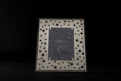 a picture of a picture frame with stars on it