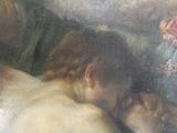 un tableau représentant une femme allongée sur un canapé