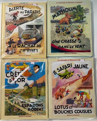 quatre livres pour enfants sont alignés sur une surface blanche