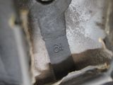a close up of a metal object with a number on it