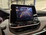 a picture of a car dashboard with a monitor on it