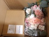 a box with a bunch of flowers inside of it