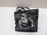 a black bag with a picture of a woman on it