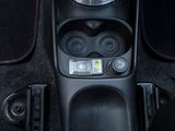 an image of a car ' s dashboard with the control panel showing