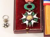 a small box with a medal and a medal on it
