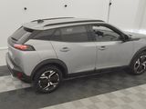 2020 toyota c - hr in a garage with a checkered floor