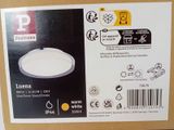 la boîte est ouverte pour permettre de voir l'intérieur du luminaire