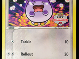 un gros plan d'une carte Pokémon représentant un animal violet
