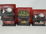 four different types of toy vehicles in the package