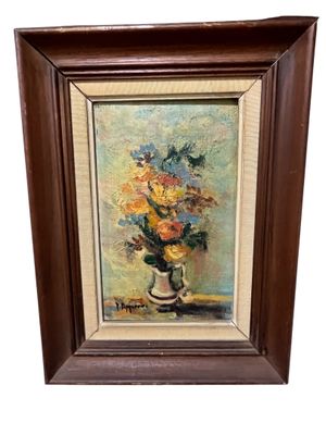 tableau représentant un vase de fleurs dans un cadre marron sur fond blanc