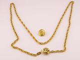 a gold plated necklace with a chain and a clasp