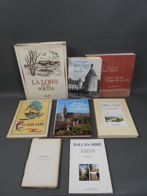 several books sitting on top of a table next to each other
