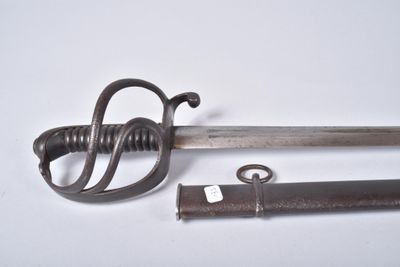 a small sword and a lighter on a white surface