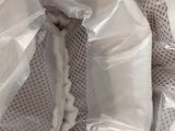 a close up of a pair of shoes in a plastic bag