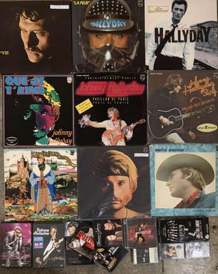 a lot of music cds and cds on the floor