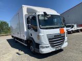an image of a white truck parked in a parking lot