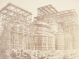 a picture of an old photo of a building under construction