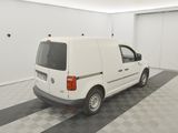 the white van is parked in the garage of the building