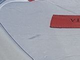 a plastic bag with a red label on it sitting on a table