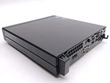 the back of a black laptop computer sitting on top of a white surface