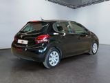 a picture of a black car parked in a showroom