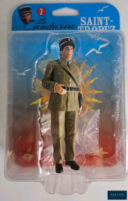 toy figure of a man in a military uniform in a plastic package