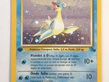 a close up of a pokemon card on a wall