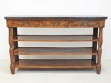 une vieille table en bois avec deux tiroirs et un plateau en marbre