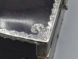 a silver box that is sitting on a table