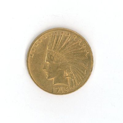 une pièce d'or sur laquelle est représentée une tête d'Indien