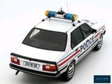 a toy police car with lights on top of it