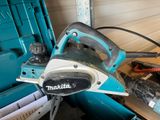 a picture of a makita planer in a workshop