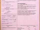 a close up of a document with a barcode on it on a table