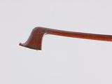 a close up of a pair of glasses with a wooden handle