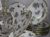 many plates stacked on top of each other on a table