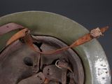 a close up of a helmet on a table